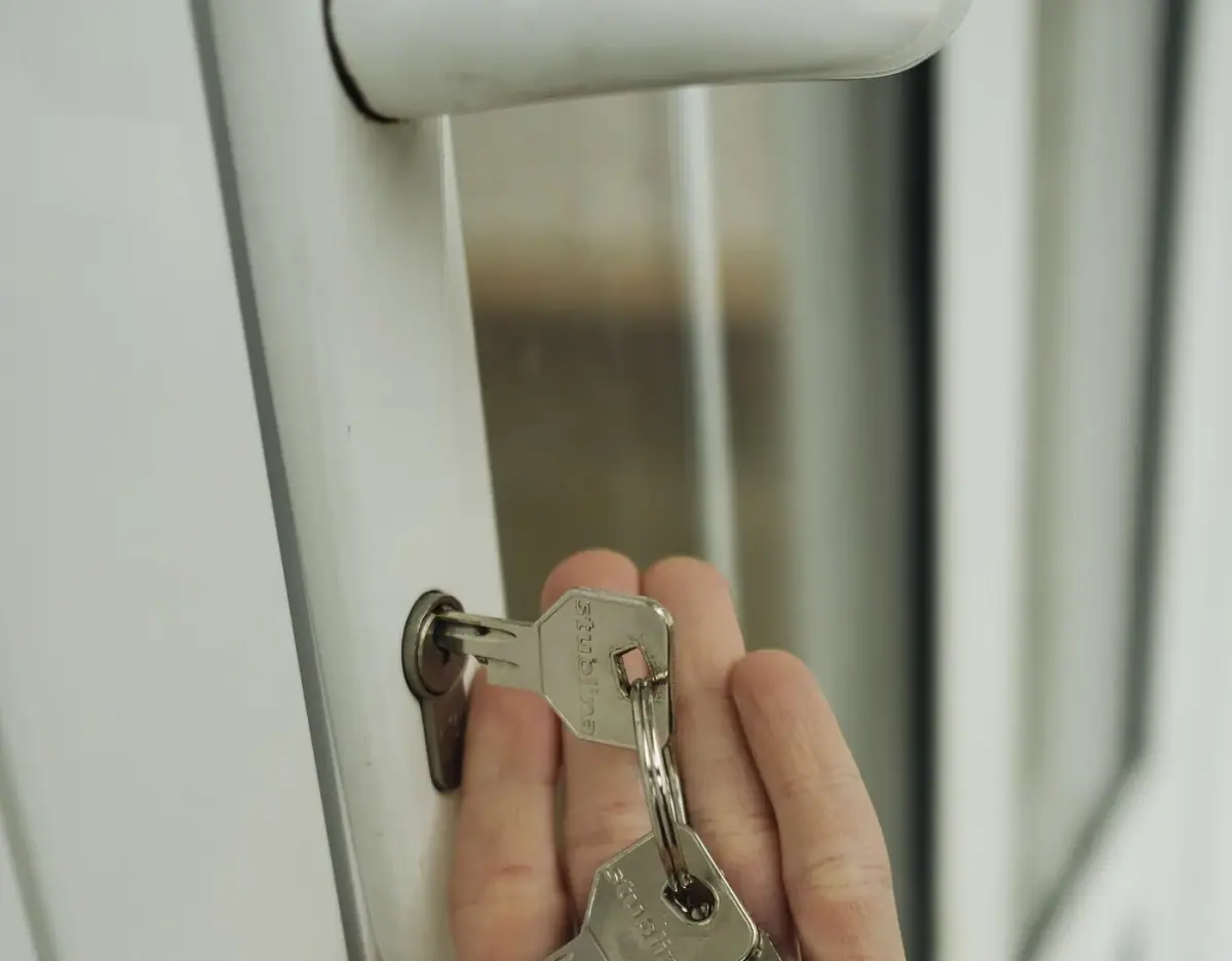 Licensed locksmith technician at a Costa Mesa home front door