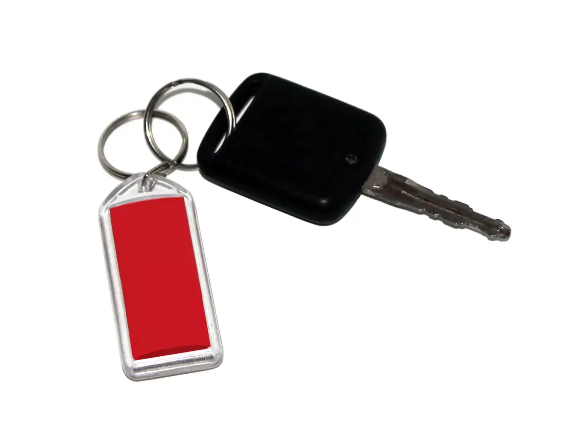 Driver receiving a new car key after losing all keys in Costa Mesa CA